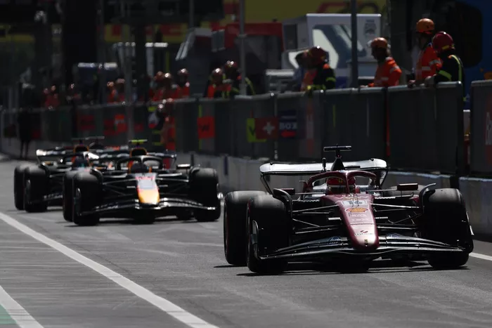 Charles Leclerc, Ferrari, Yuki Tsunoda, Red Bull Racing Team
