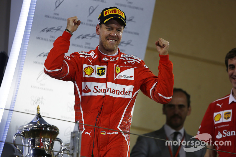 Подиум: победитель Себастьян Феттель, Ferrari