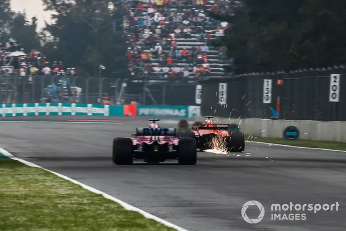 Sergio Perez, Racing Point Force India VJM11 y Sebastian Vettel, Ferrari SF71H 