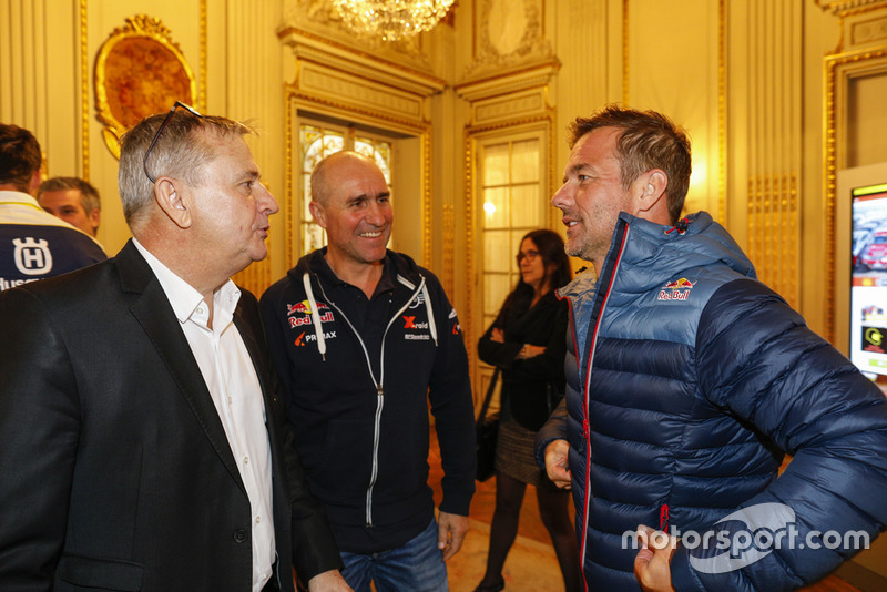 Dakar race director Etienne Lavigne with Stéphane Peterhansel and Sébastien Loeb