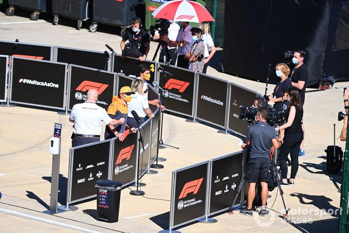 Lando Norris, McLaren y Carlos Sainz Jr., McLaren