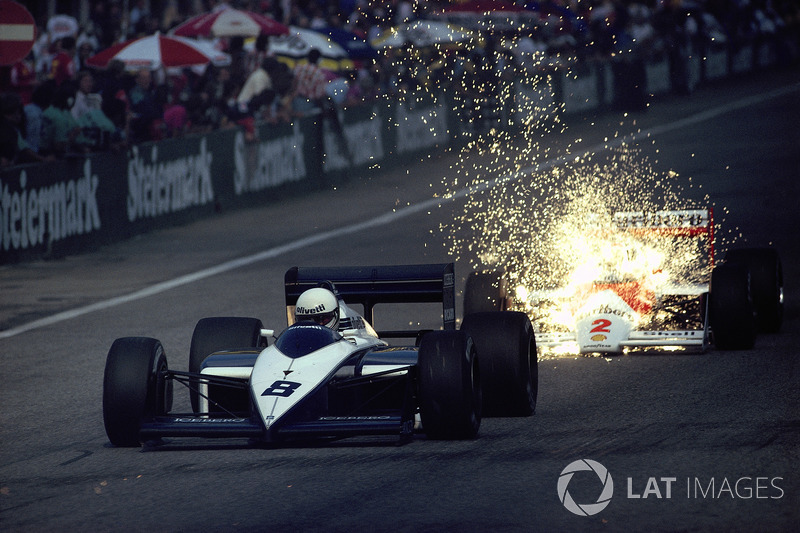 1987 - Andrea de Cesaris, Brabham, throws sparks onto Stefan Johansson, McLaren