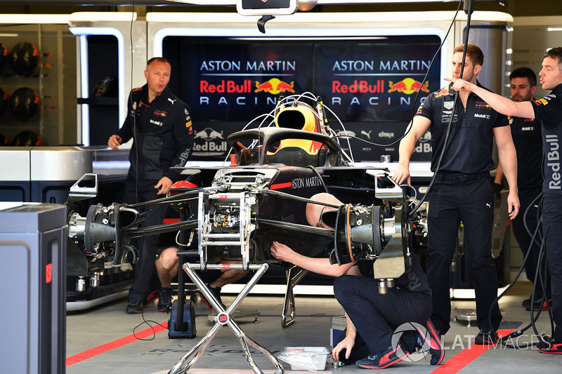 Red Bull Racing RB14 is worked on in the garage