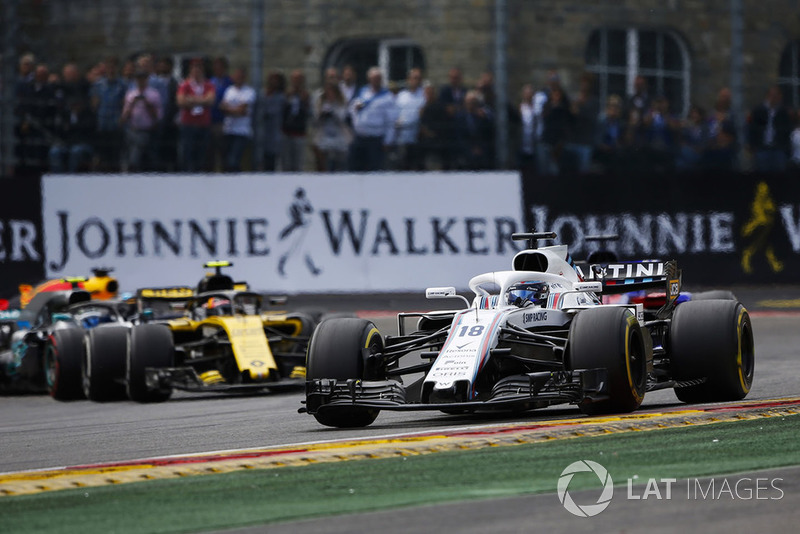 Lance Stroll, Williams FW41, Carlos Sainz Jr., Renault Sport F1 Team R.S. 18, y Valtteri Bottas, Mercedes AMG F1 W09
