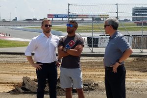 SMI President Marcus Smith, NASCAR driver Bubba Wallace and Charlotte Motor Speedway Executive Vice-President and General Manager Greg Walter