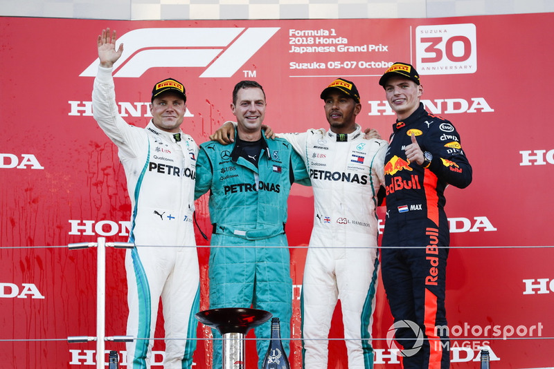 Second place Valtteri Bottas, Mercedes AMG F1, the Mercedes Constructors trophy delegate, Race winner Lewis Hamilton, Mercedes AMG F1,and third place Max Verstappen, Red Bull Racing, on the podium