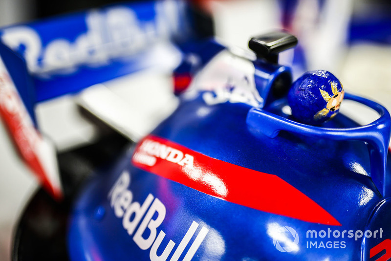 A fan's hat decorated in support of Toro Rosso