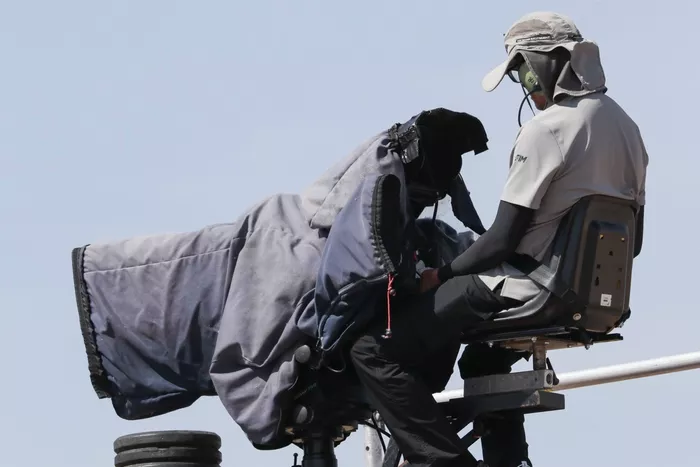  A camera man films the first MotoGP Practice 