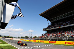 Max Verstappen, Red Bull Racingtakes the chequered flag for his first F1 win