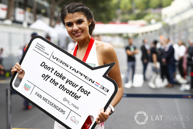 Models display messages from fans on the grid