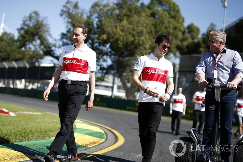 Charles Leclerc, Alfa Romeo Sauber F1 Team walks the track and talks with Johnny Herbert, Sky TV