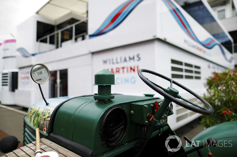A tractor next to the Williams hospitality unit