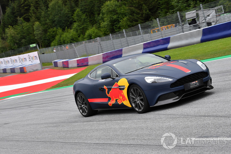 Max Verstappen, Red Bull Racing in an Aston Martin