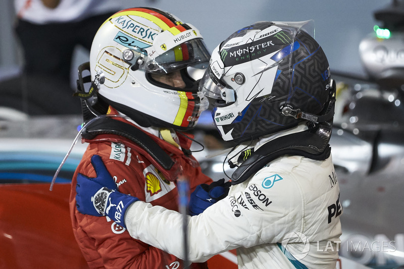 Valtteri Bottas, Mercedes AMG F1, 2nd position, congratulates Sebastian Vettel, Ferrari, 1st positio