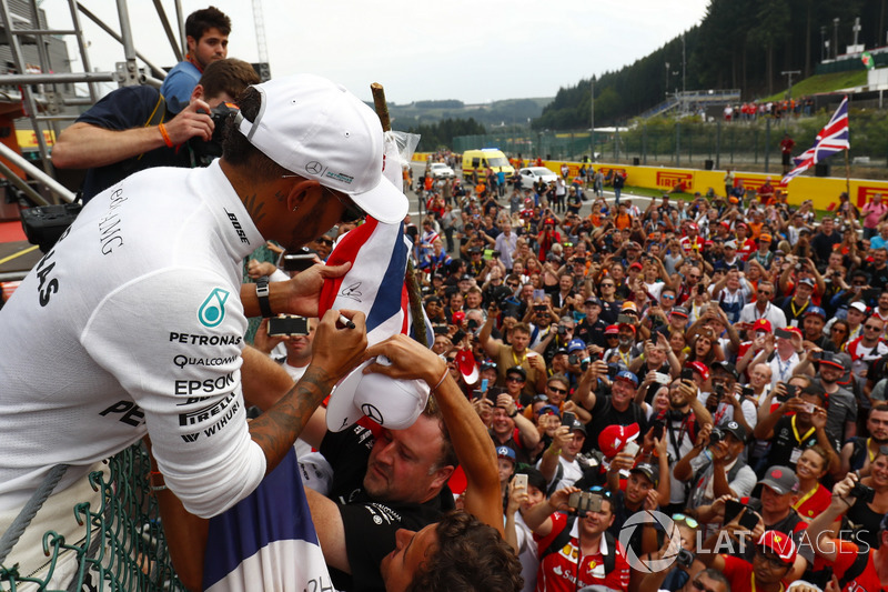 Race winner Lewis Hamilton, Mercedes AMG F1, celebrates with fans after the race