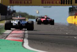 Lewis Hamilton, Mercedes AMG F1 W08, chases Kimi Raikkonen, Ferrari SF70H