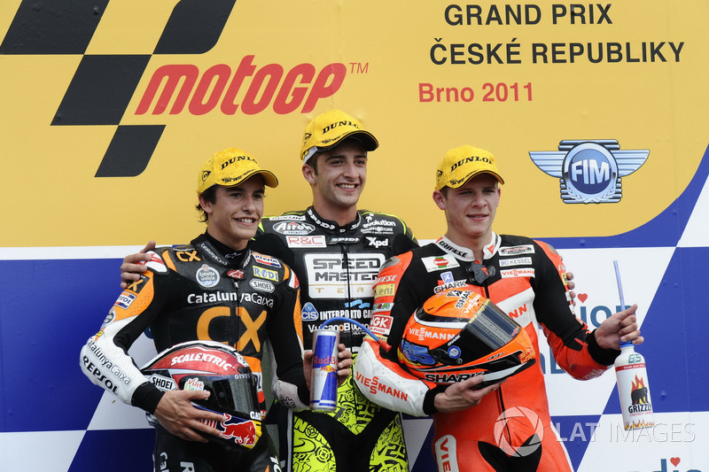 Podio: segundo lugar Marc Márquez, ganador de la carrera Andrea Iannone, tercer lugar Stefan Bradl