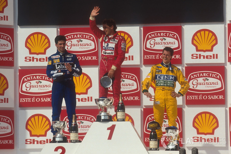 Podium: Race winner Ayrton Senna, McLaren, second place Damon Hill, Williams, third place Michael Sc