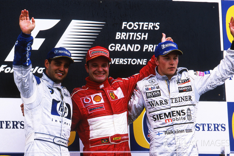 Podyum: 2. Juan Pablo Montoya, Williams, yarış galibi Rubens Barrichello, Ferrari, 3. Kimi Raikkonen, McLaren