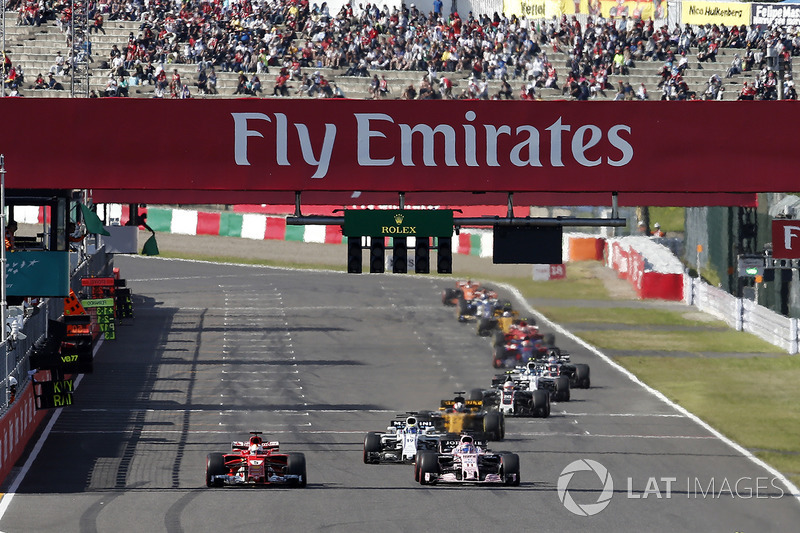 Romain Grosjean, Haas F1 Team VF-17 y Esteban Ocon, Sahara Force India VJM10