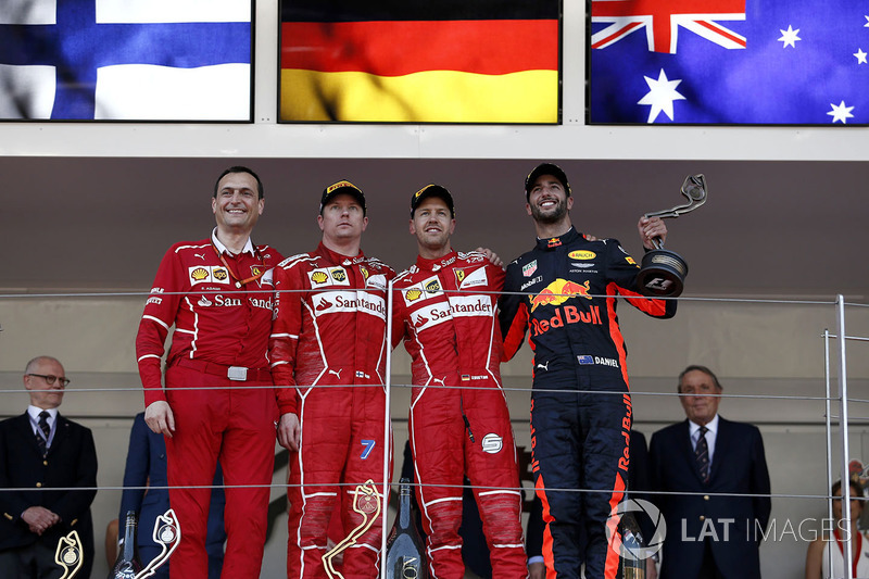 Riccardo Adami, Ferrari Race Engineer, Kimi Raikkonen, Ferrari, race winner Sebastian Vettel, Ferrari and Daniel Ricciardo, Red Bull Racing celebrate on the podium with the trophies