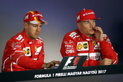 Pole sitter Sebastian Vettel, Ferrari and Kimi Raikkonen, Ferrari