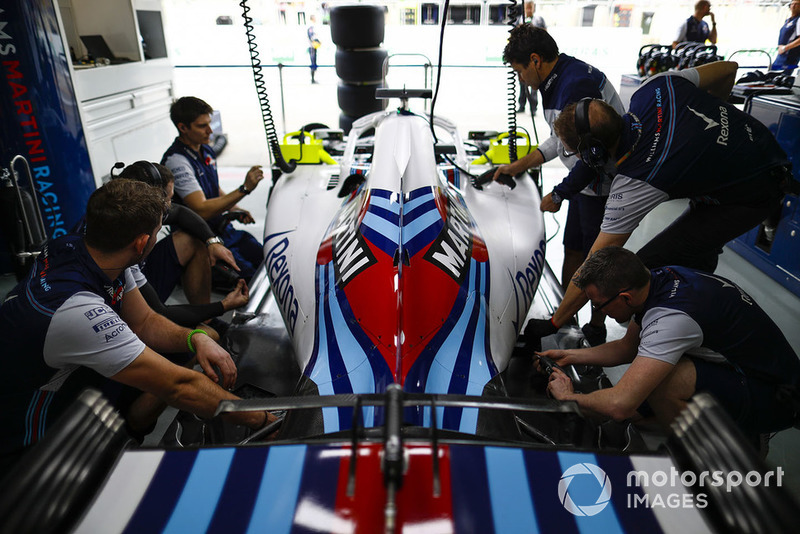 Williams team members at work in the team's garage