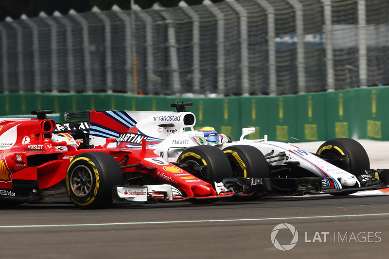 Sebastian Vettel, Ferrari SF70H, battles Felipe Massa, Williams FW40