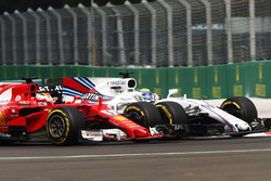 Sebastian Vettel, Ferrari SF70H, battles Felipe Massa, Williams FW40