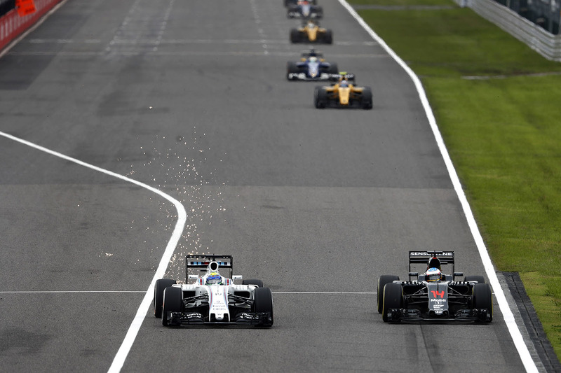 Felipe Massa, Williams FW38 and Fernando Alonso, McLaren MP4-31