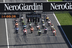 Start: Valentino Rossi, Yamaha Factory Racing, Andrea Iannone, Ducati Team on the front row