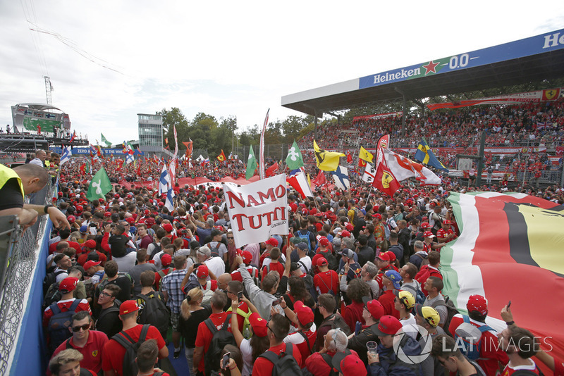 Fans watch the podium