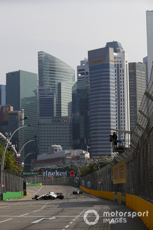 Sergey Sirotkin, Williams FW41, leads Lance Stroll, Williams FW41
