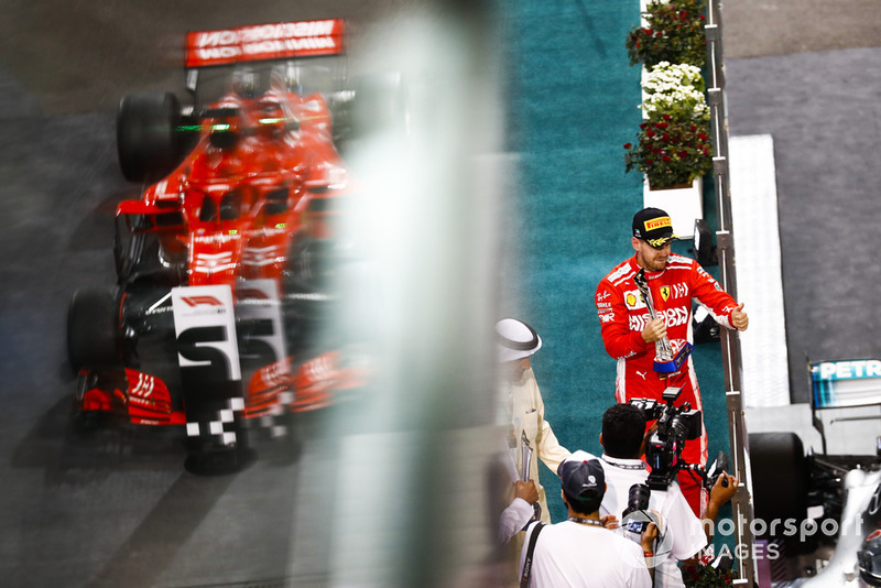 Sebastian Vettel, Ferrari, 2nd position, with his trophy on the podium