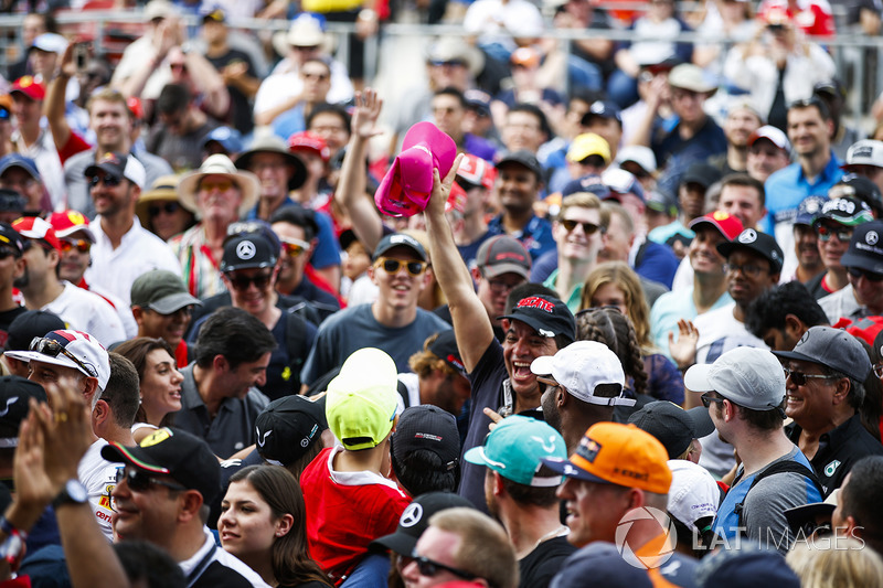 a huge crowd gathered around the stage