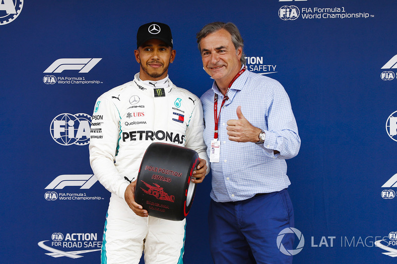 Lewis Hamilton, Mercedes AMG F1, celebrates pole position with Carlos Sainz