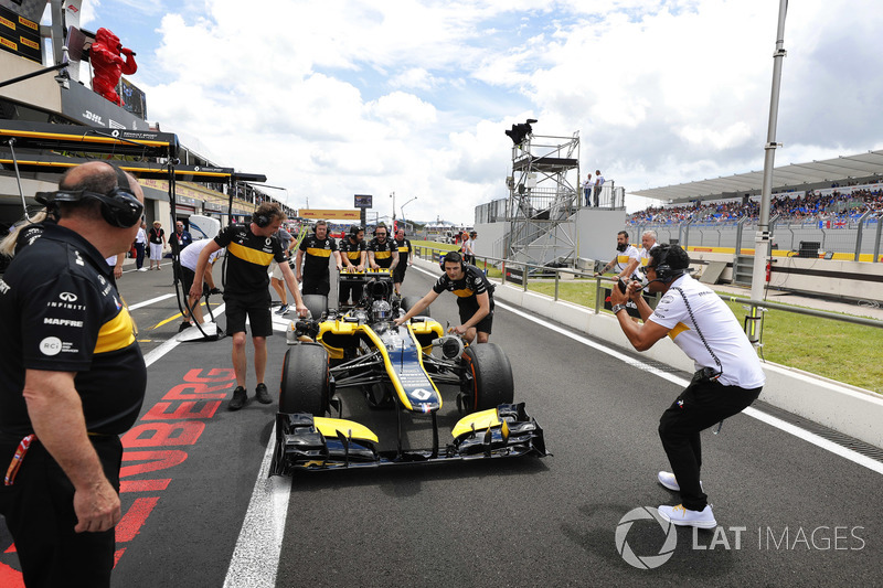 Aseel Al-Hamad, prepares to drive a 2012 Lotus E20 Renault F1 car in the Renault Passion Parade