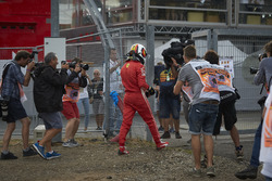 Sebastian Vettel, Ferrari SF71H, walks away from his car after crashing out from the lead
