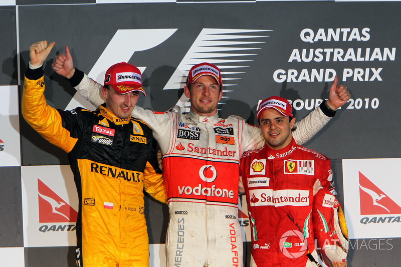 Podio: segundo puesto Robert Kubica, Renault F1 Team, ganador de la carrera Jenson Button, McLaren, 