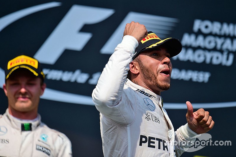 Race winner Lewis Hamilton, Mercedes AMG F1 celebrates on the podium