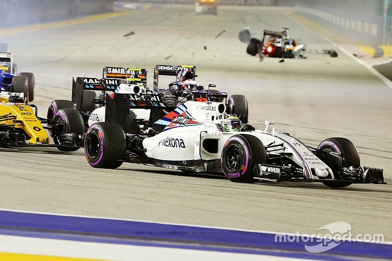 Felipe Massa, Williams FW38 at the start of the race as Nico Hulkenberg, Sahara Force India F1 VJM09 crashes out