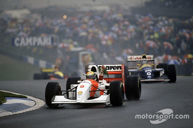 Ayrton Senna, McLaren MP4/8 Ford, celebrates 1st position