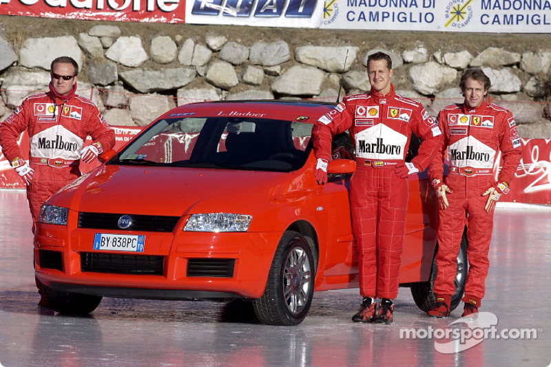 Rubens Barrichello, Michael Schumacher and Luca Badoer with the Fiat Stilo