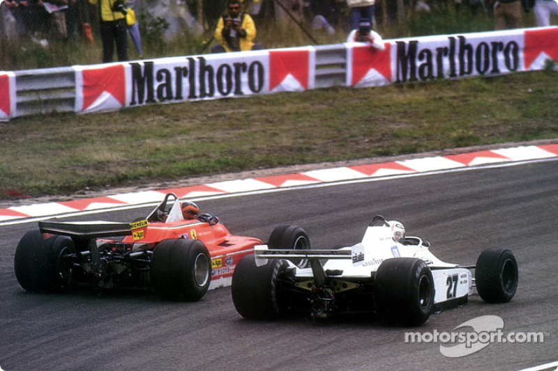 They said it couldn't be done: Gilles Villeneuve passing Alan Jones from the exterior of the spectacular Tarzan curve at Zandvoort