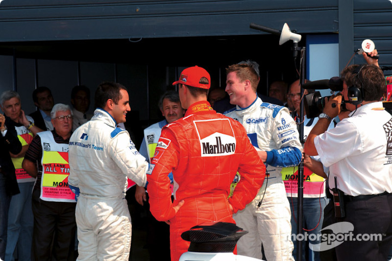 El ganador de la pole, Juan Pablo Montoya, Michael Schumacher y Ralf Schumacher