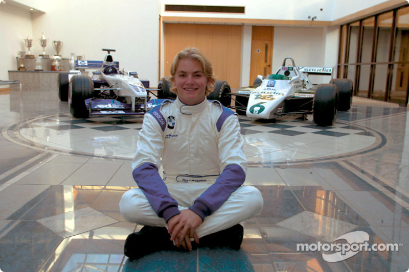 Nico Rosberg with the 2002 Williams FW24 and the Williams FW08 his dad Keke drove the the World Cham