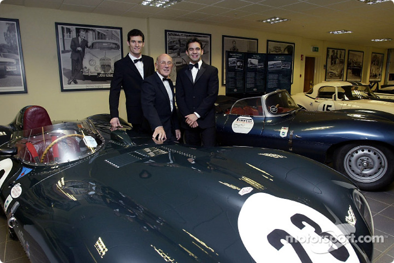 Sir Stirling Moss poses with Jaguar F1 drivers Mark Webber and Antonio Pizzonia at the launch of the NSPCC Coventry Campaign