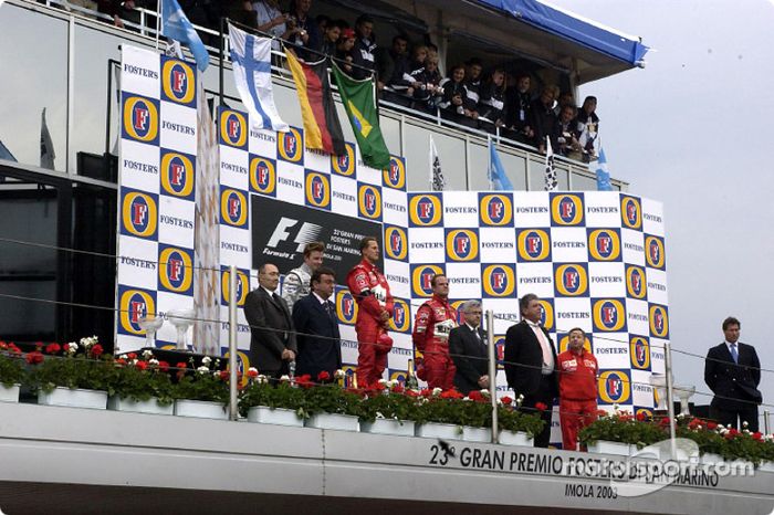 Podio: el ganador Michael Schumacher, Kimi Raikkonen y Rubens Barrichello