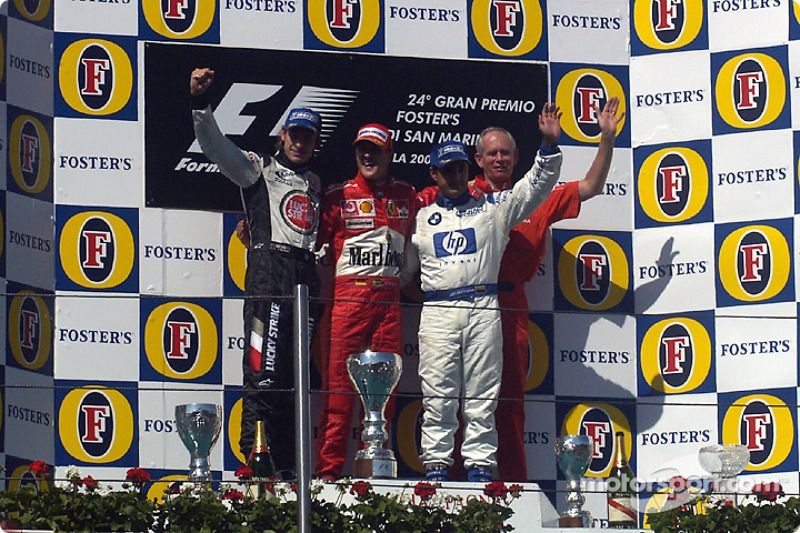 Podio: el ganador de la carrera Michael Schumacher con Jenson Button y Juan Pablo Montoya