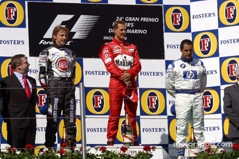 Podio: el ganador de la carrera Michael Schumacher con Jenson Button y Juan Pablo Montoya